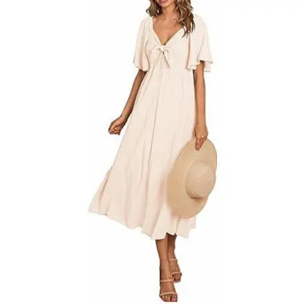2025 Spring/Summer Women's Dress Fashion New V-neck Bow Fold Medium Length Short Sleeved Dress Printed Holiday Beach Long Dress