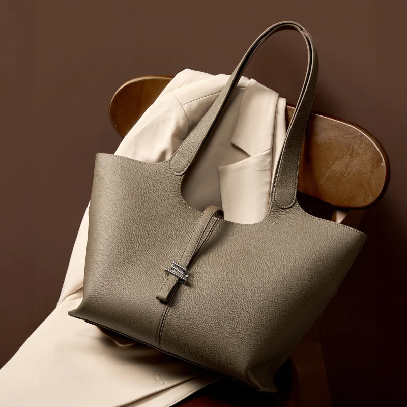 Head layer cowhide wind chime tote bag for women, large capacity commuting handbag single shoulder leather handbag for women