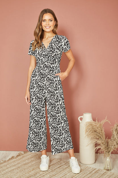 Yumi Black And White Wrap Over Stretch Jumpsuit