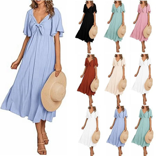 2025 Spring/Summer Women's Dress Fashion New V-neck Bow Fold Medium Length Short Sleeved Dress Printed Holiday Beach Long Dress