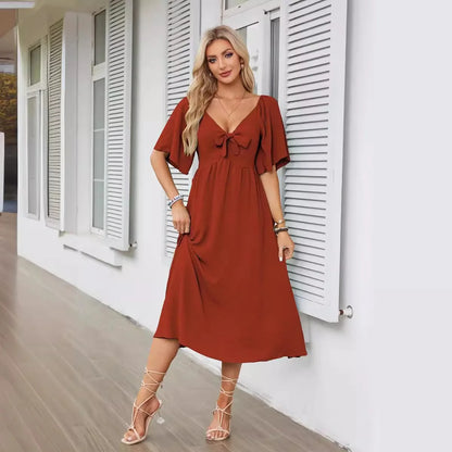 2025 Spring/Summer Women's Dress Fashion New V-neck Bow Fold Medium Length Short Sleeved Dress Printed Holiday Beach Long Dress