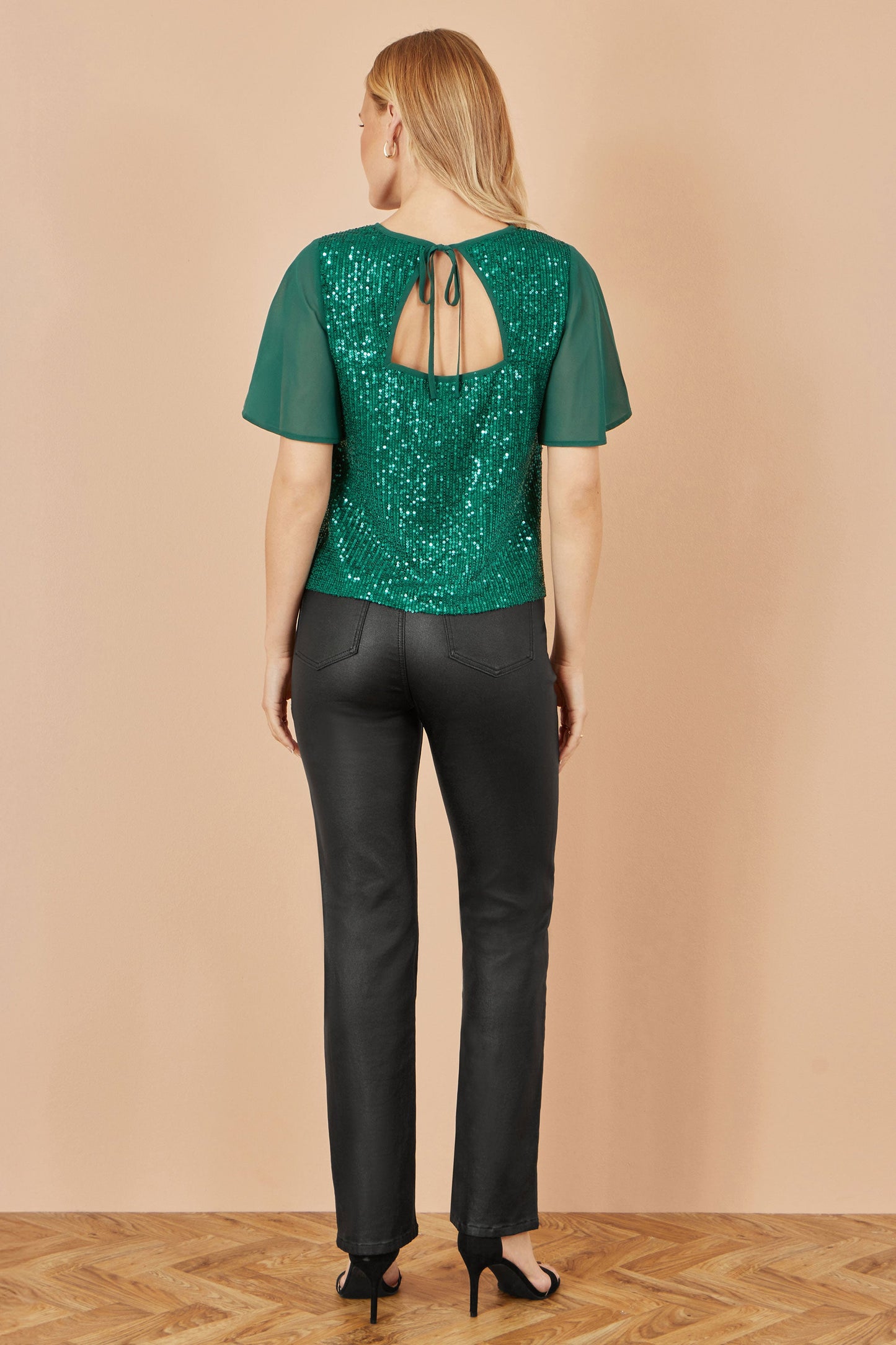 Yumi Green Sequin Top With Sheer Sleeves And Cut Out Back