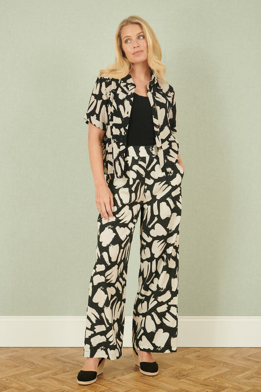 Yumi Black Cotton Splash Print Relaxed Fit Trousers
