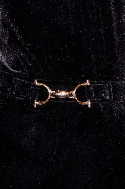 Yumi Black Velvet Jumpsuit With Twist Neckline And Buckle Belt